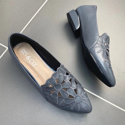 Zapatos de piel huecos y transpirables.