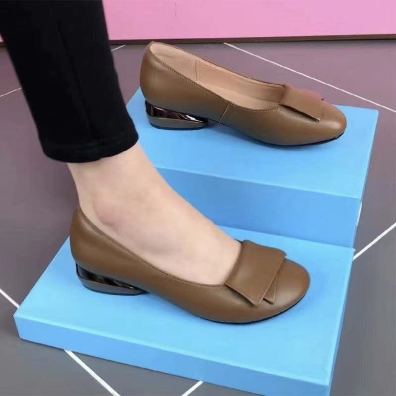 Zapatos planos de piel con punta redonda
