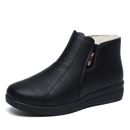 Botas planas de piel de terciopelo
