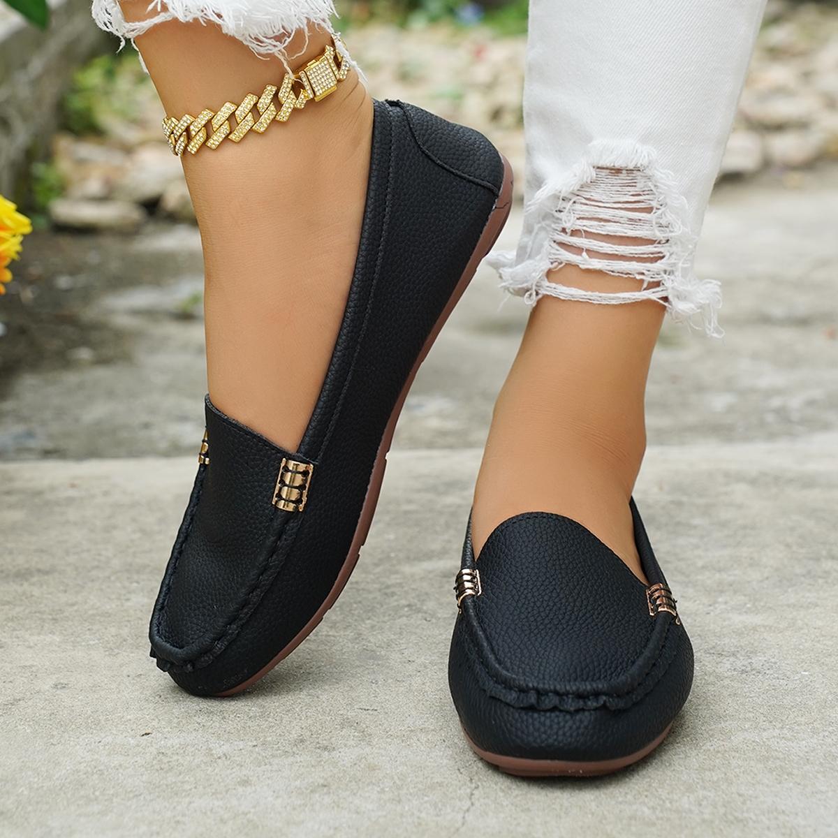 Zapatos planos de mujer, sin cordones.