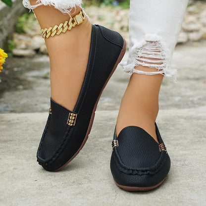 Zapatos planos de mujer, sin cordones.