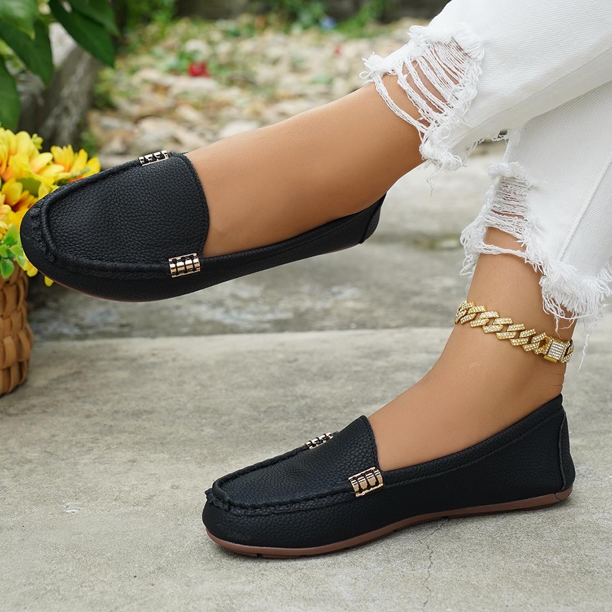 Zapatos planos de mujer, sin cordones.