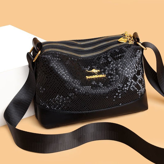 Bolso de piel brillante texturizada en dos tonos