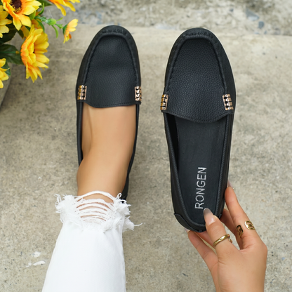 Zapatos planos de mujer, sin cordones.
