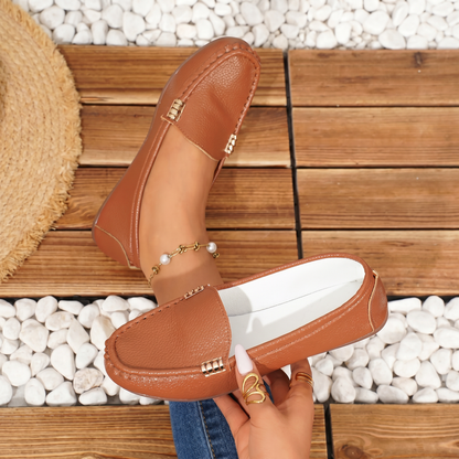 Zapatos planos de mujer, sin cordones.