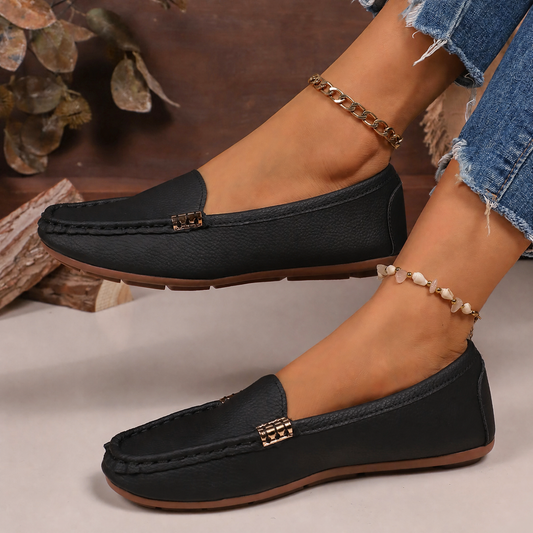 Zapatos planos de mujer, sin cordones.