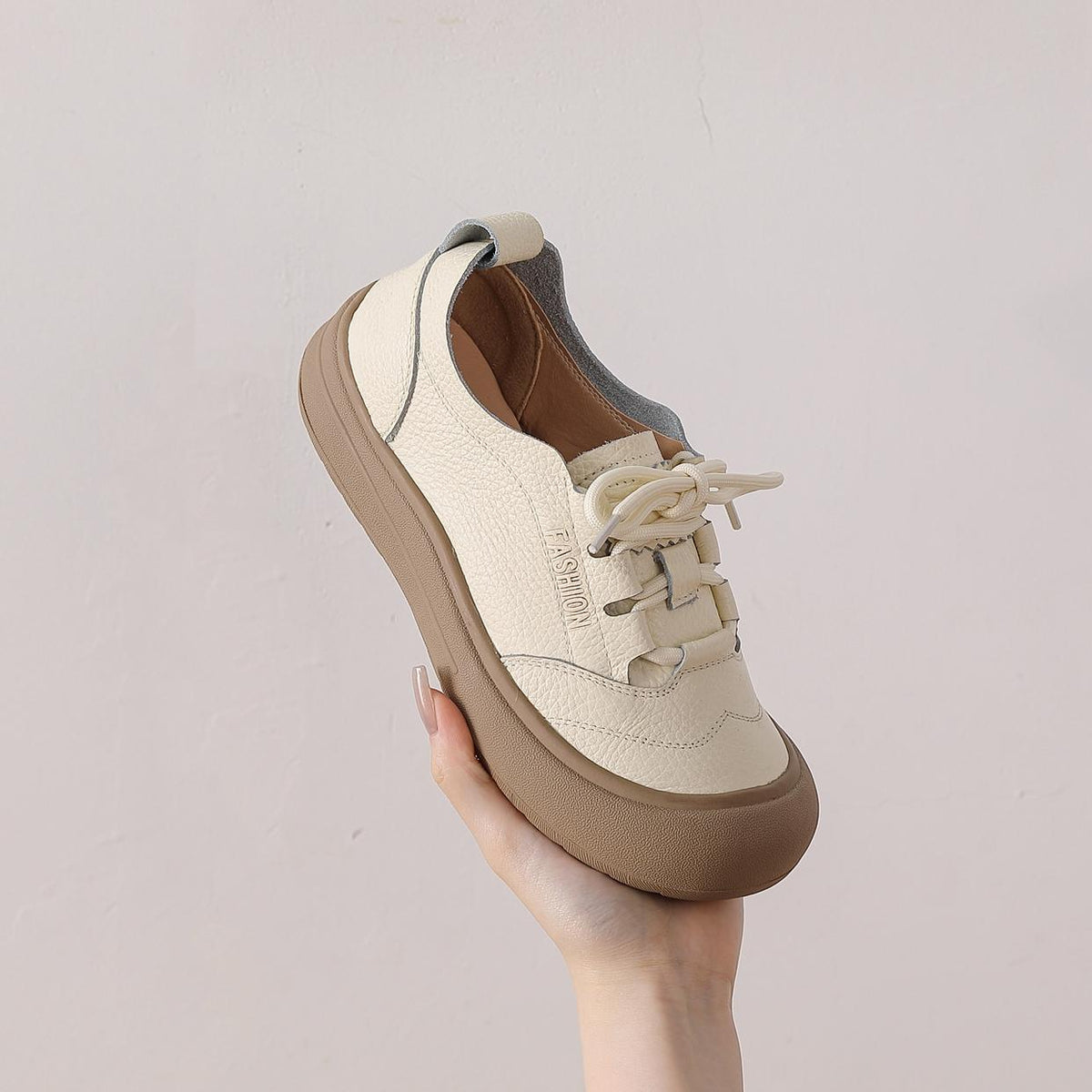Zapatos casuales de piel genuina con punta redonda y suela suave