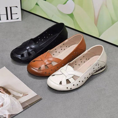Sandalias planas caladas para mujer