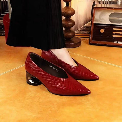 Zapatos de piel con tacón en bloque y estampado de serpiente