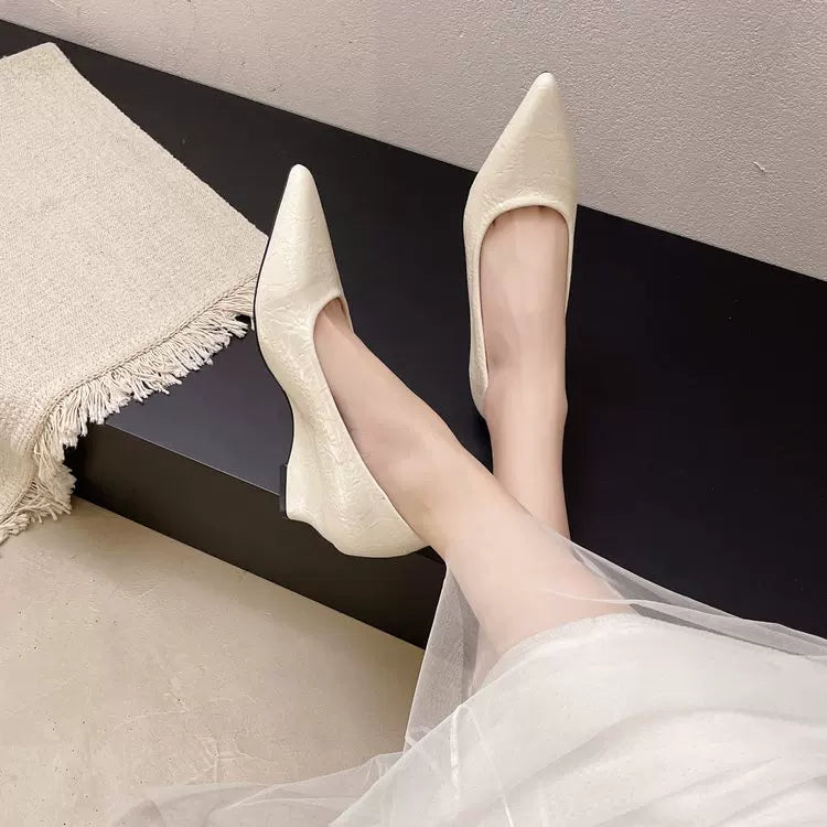 Zapatos de mujer escotados con tacón de cuña