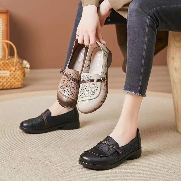 Zapatos planos perforados de punta redonda para mujer