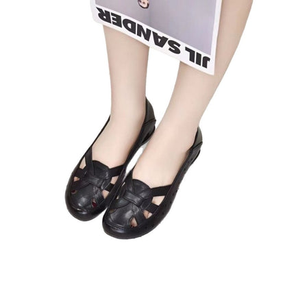 Sandalias planas caladas para mujer