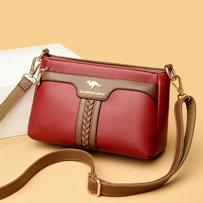 Bolso con bloques de color canguro 2025