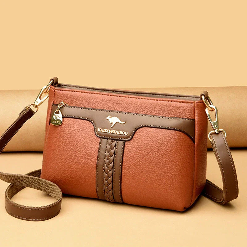 Bolso con bloques de color canguro 2025