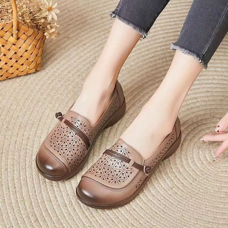 Zapatos planos perforados de punta redonda para mujer