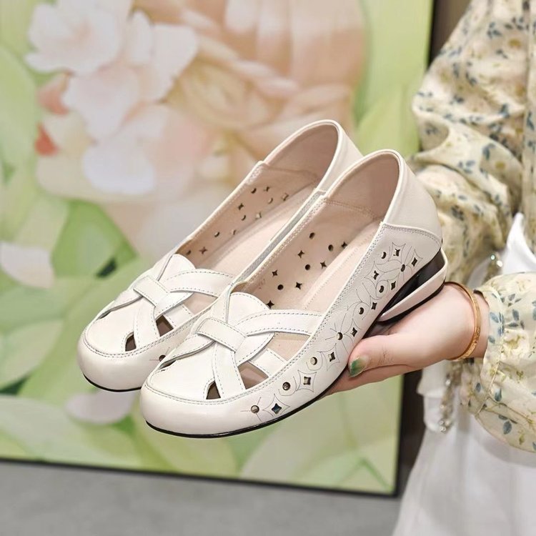 Sandalias planas caladas para mujer