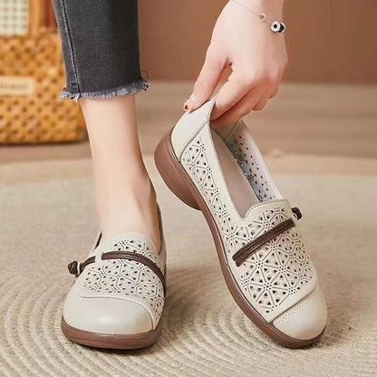 Zapatos planos perforados de punta redonda para mujer